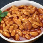 baked beans in white bowl